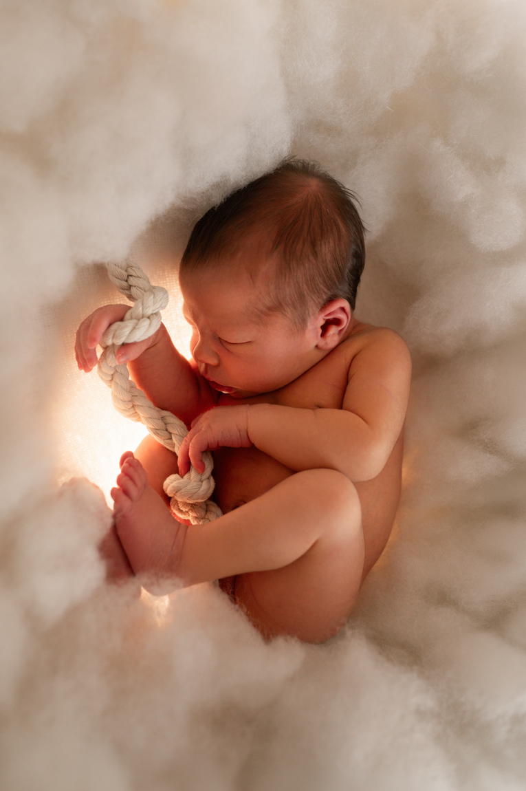 Baby wie im Bauch der Mama eingekuschelt